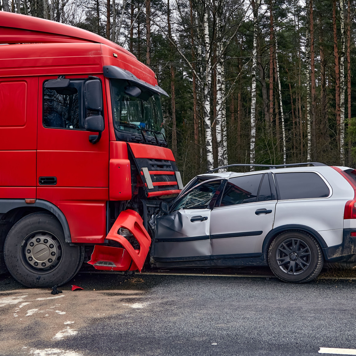 Car and 18-wheeler truck involved in an accident.