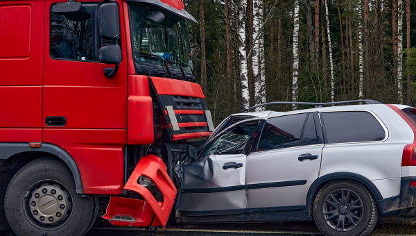 Car and 18-wheeler truck involved in an accident.