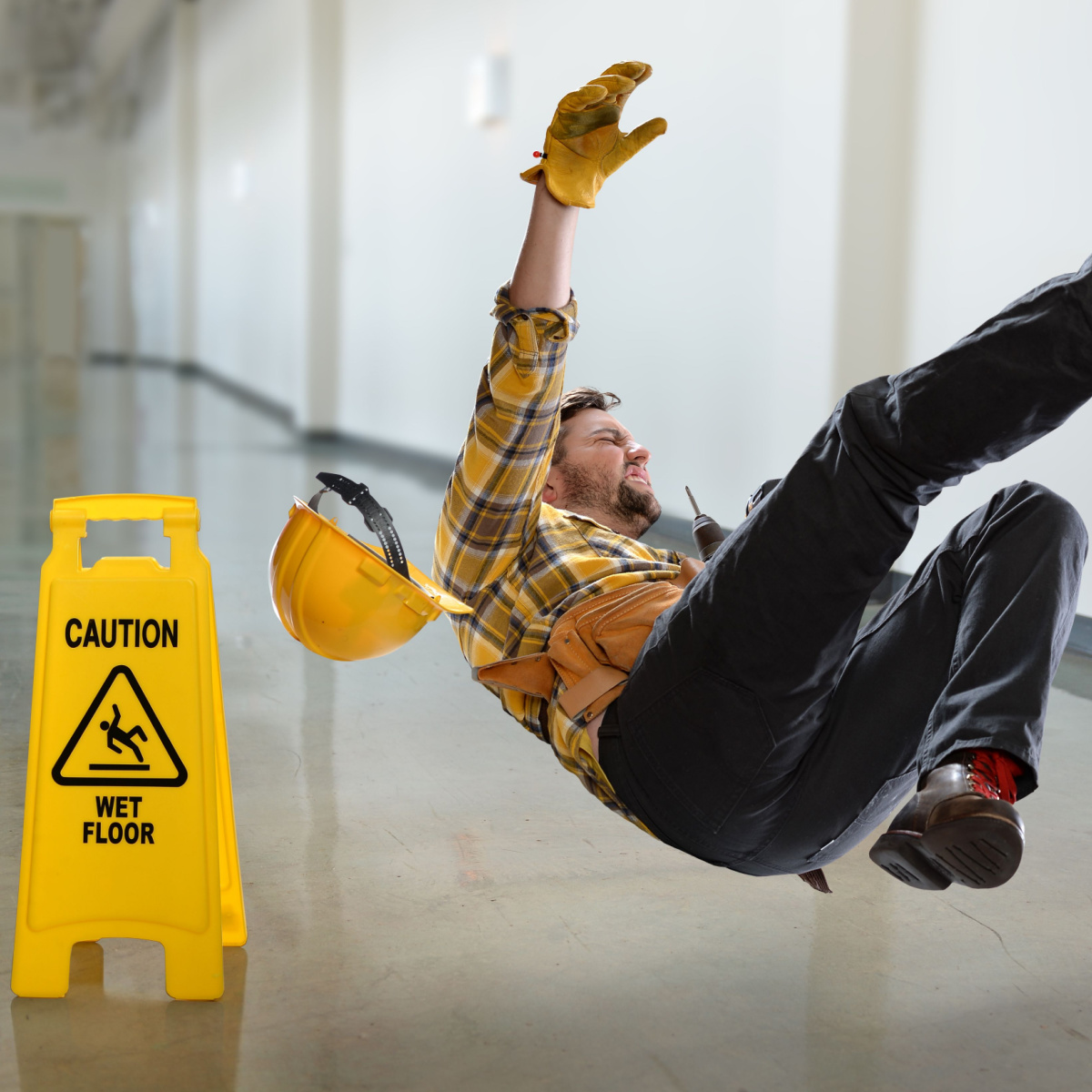A worker slips and falls in the workplace, likely sustaining a Houston personal injury.