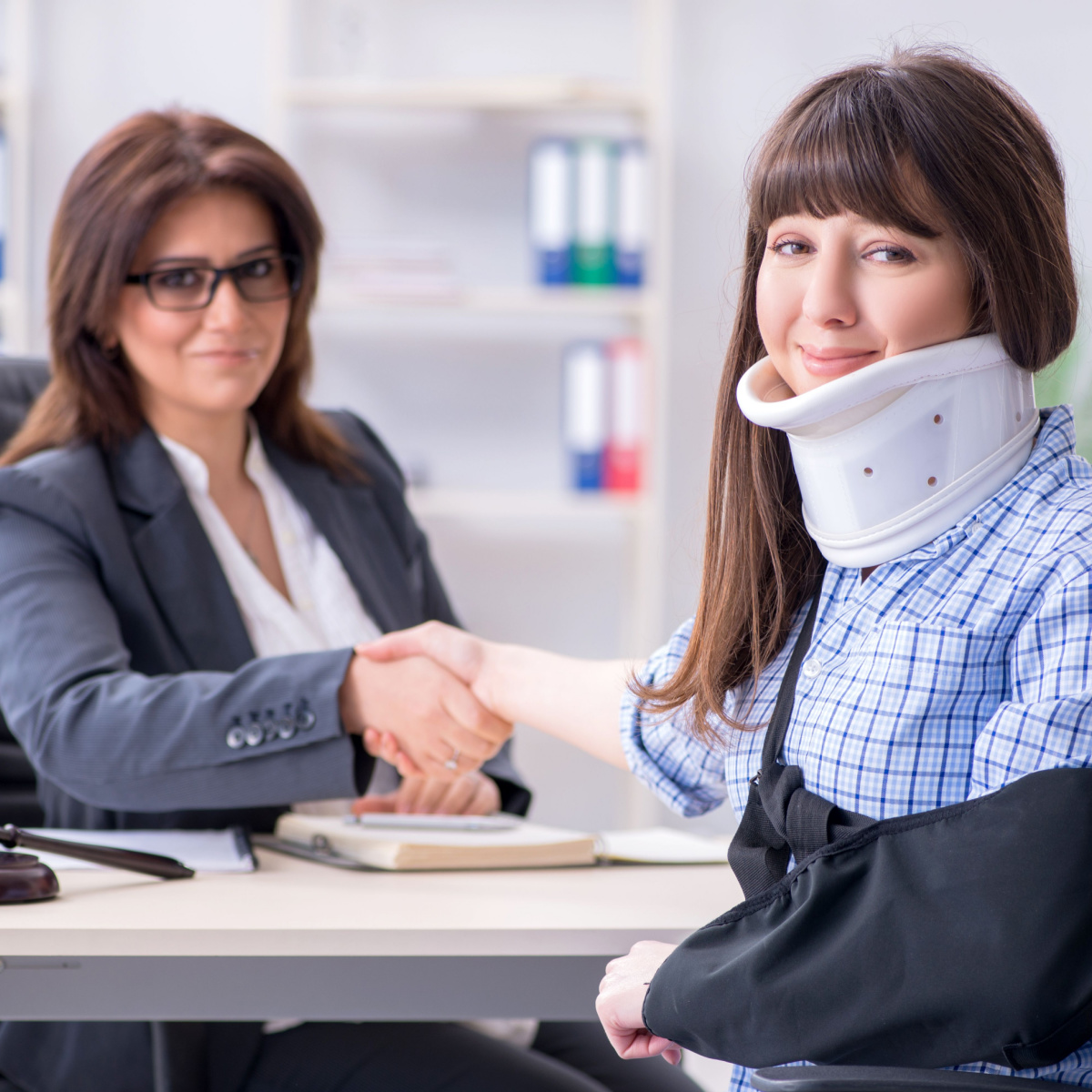 Houston personal injury lawyer helps her client document her injuries.